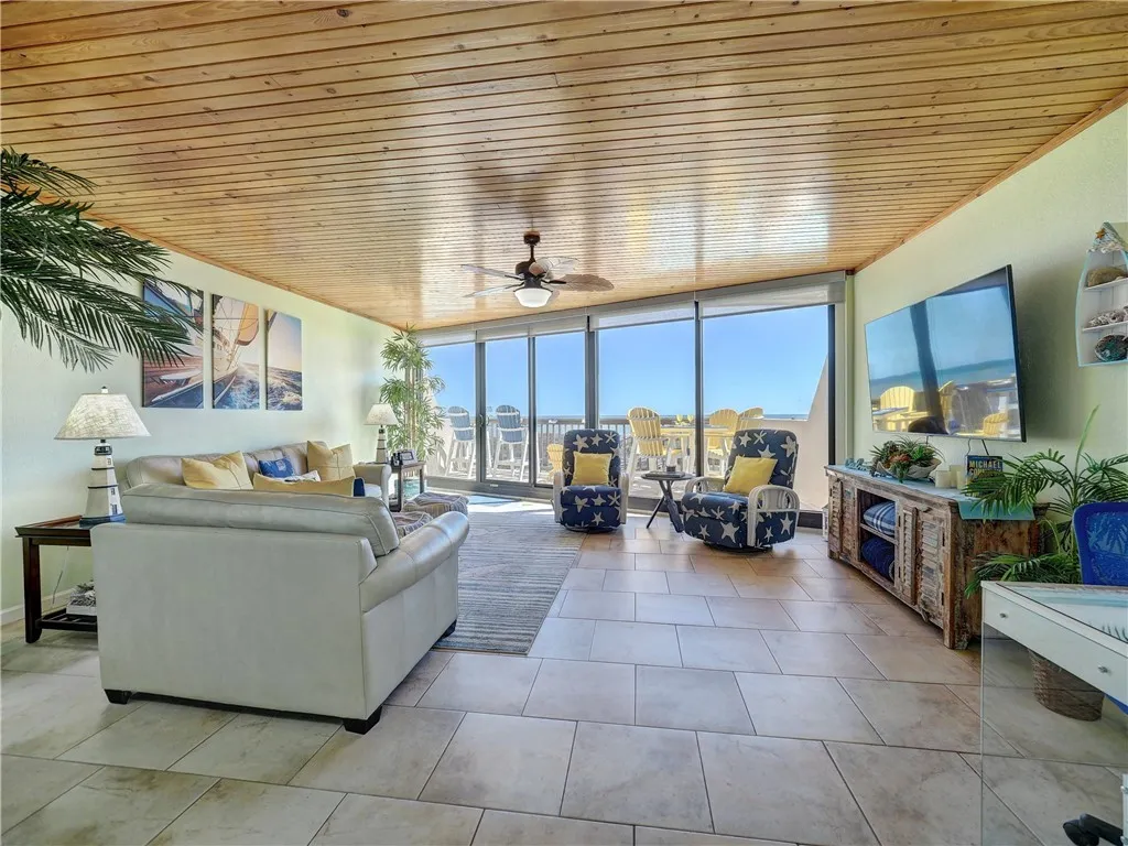 Open living area with Gulf views through floor-to-ceiling windows